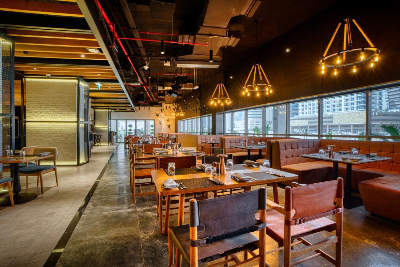 The First Collection Dubai Business Bay Hotel Exterior photo Interior of the restaurant