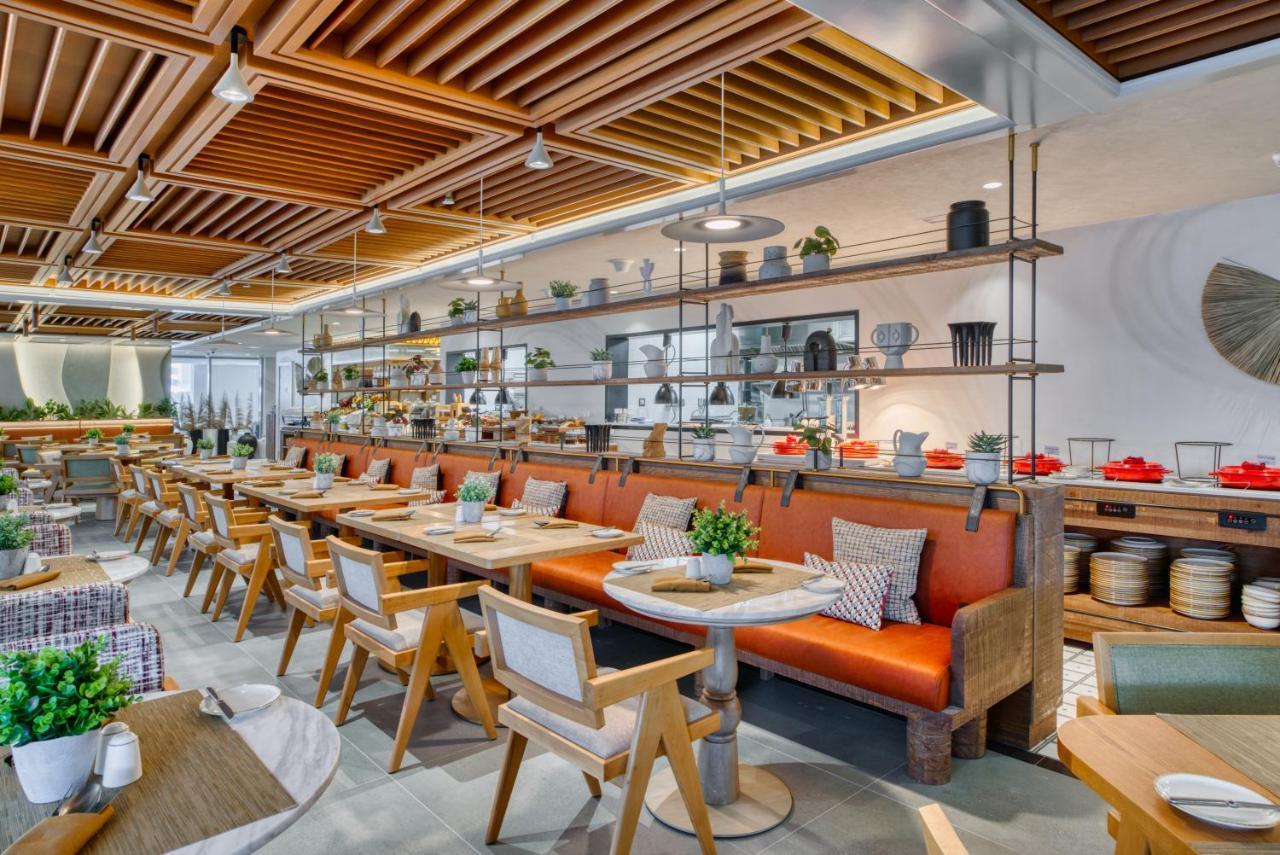 The First Collection Dubai Business Bay Hotel Exterior photo Interior of the restaurant