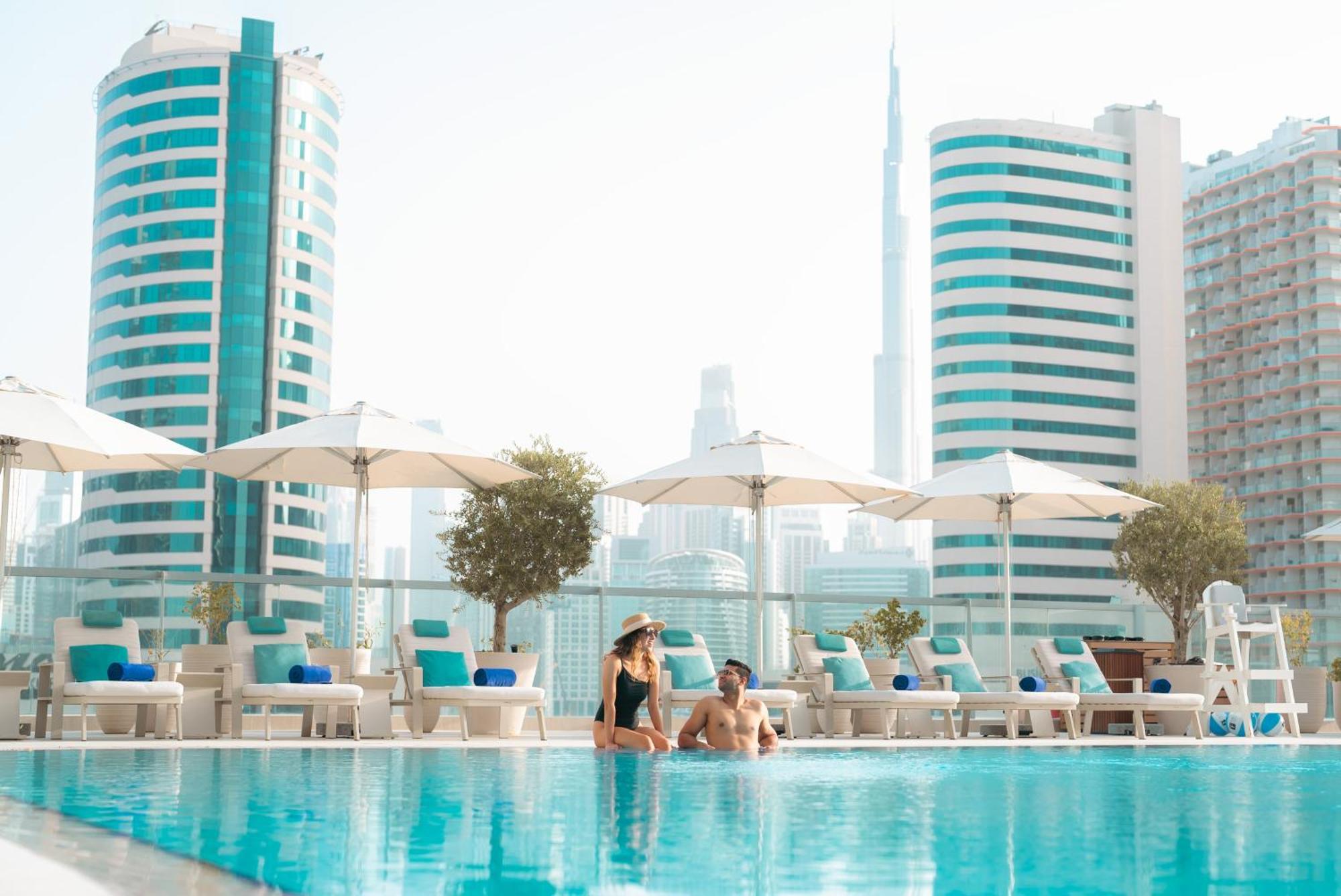 The First Collection Dubai Business Bay Hotel Exterior photo "The pool is the best place to relax"